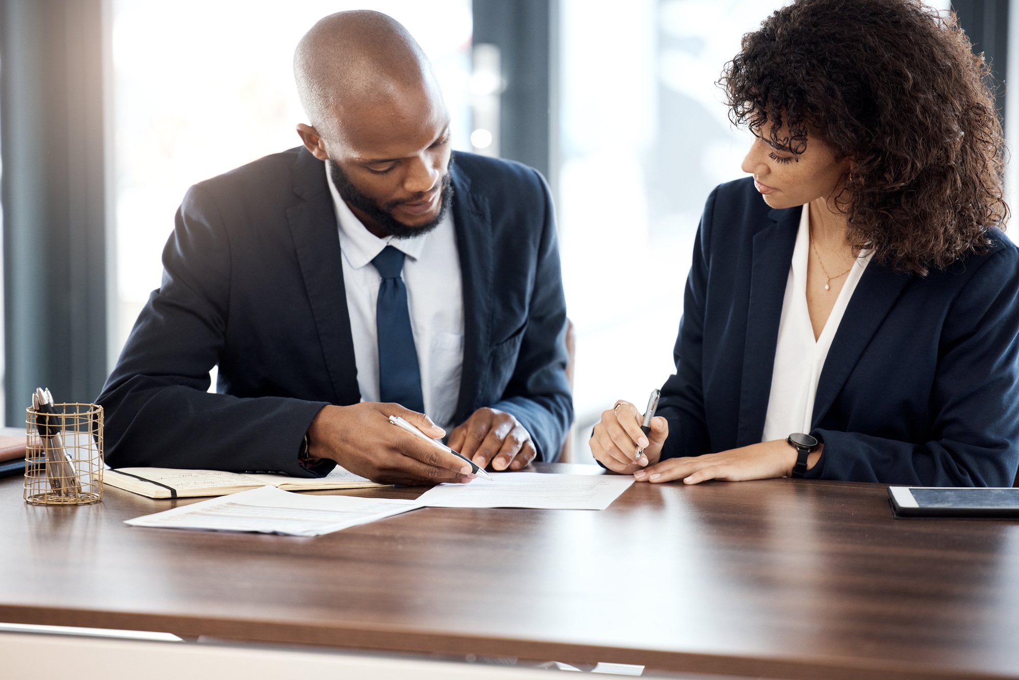 Documents, business and black people planning with contract for accounting budget, company portfoli